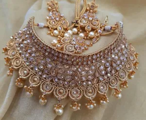 Dazzling  jewellery sets in gold and crystals