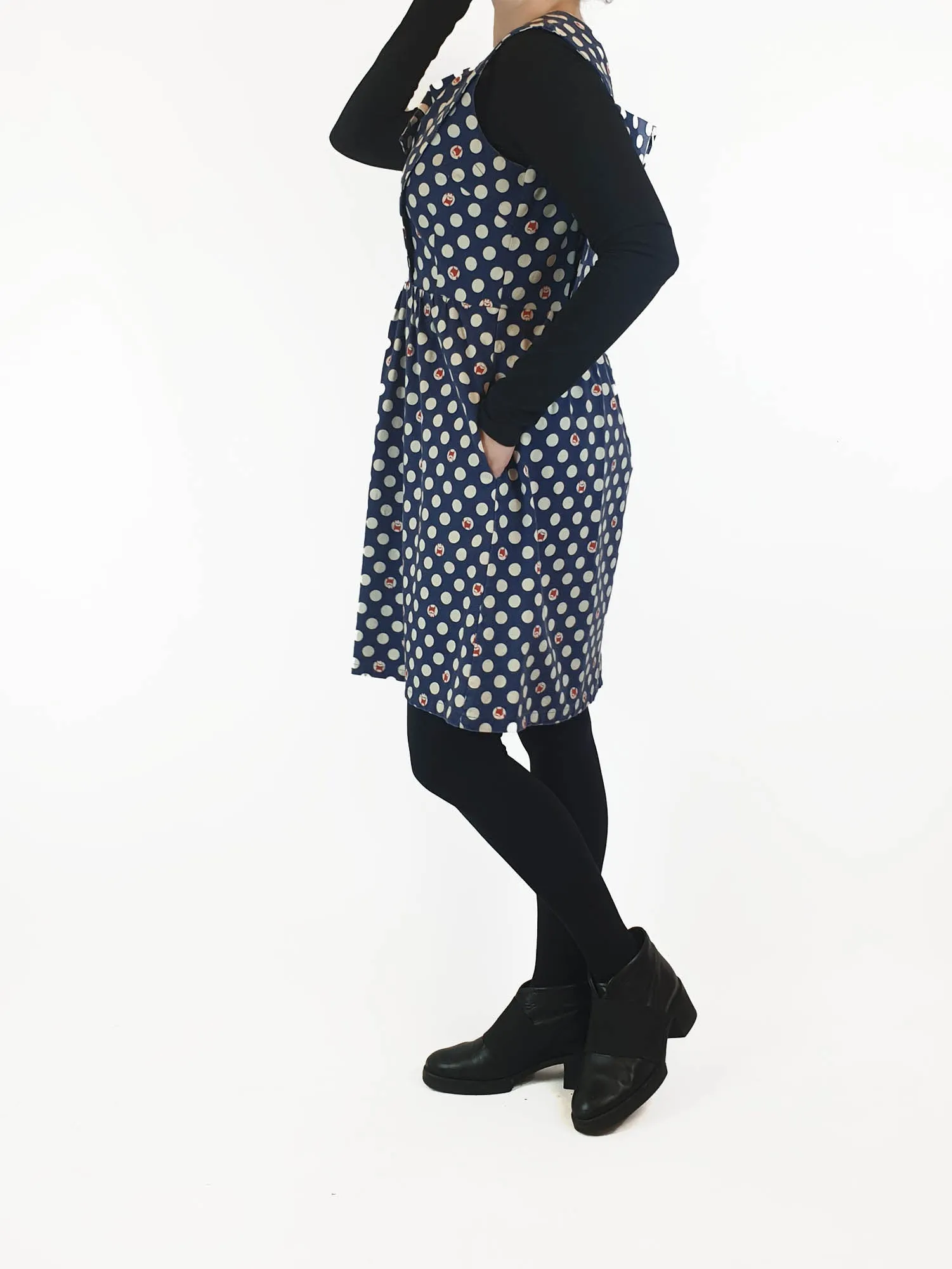 Made590 sleeveless blue and white polka dot dress with dog faces size M (best fits 10)