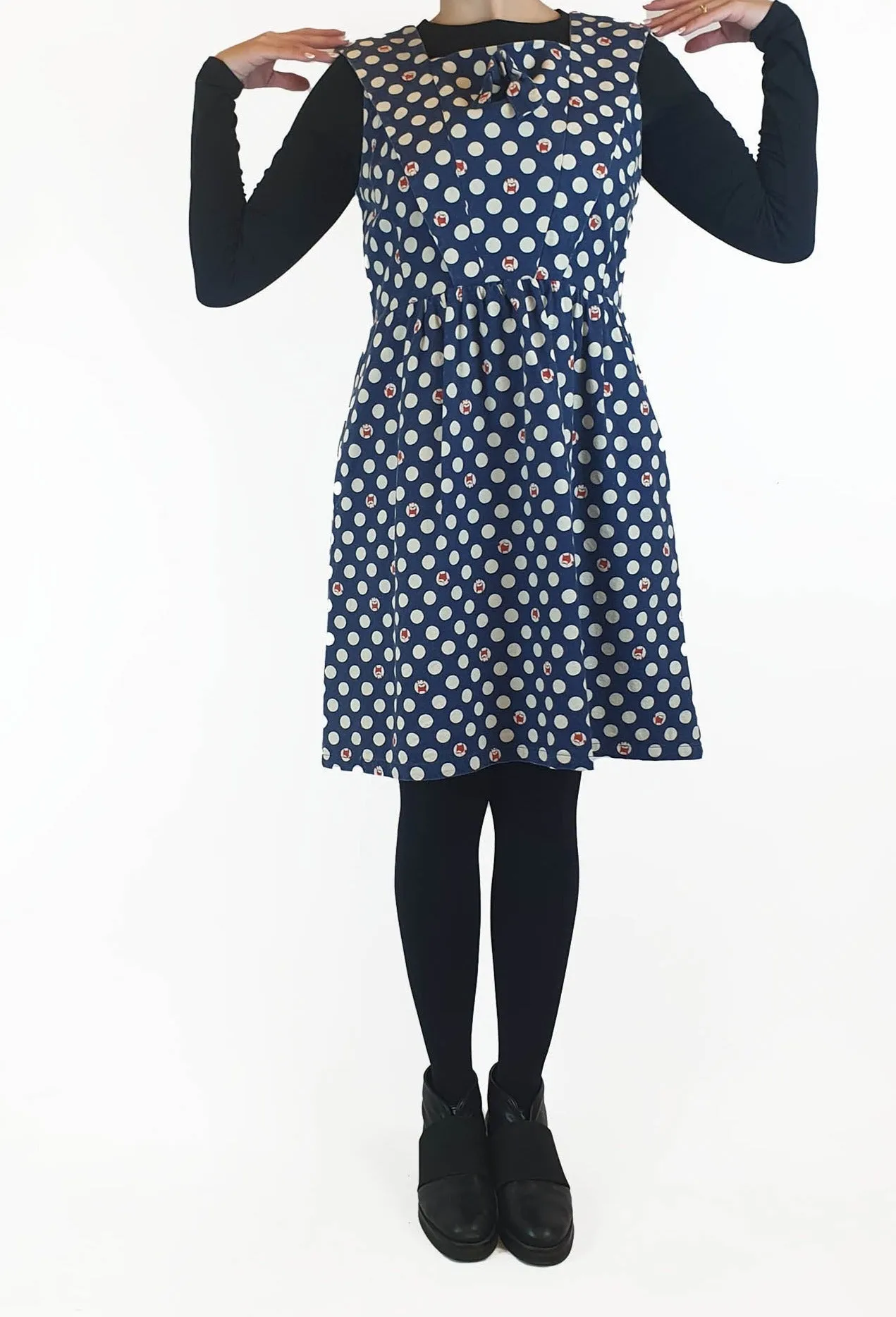 Made590 sleeveless blue and white polka dot dress with dog faces size M (best fits 10)