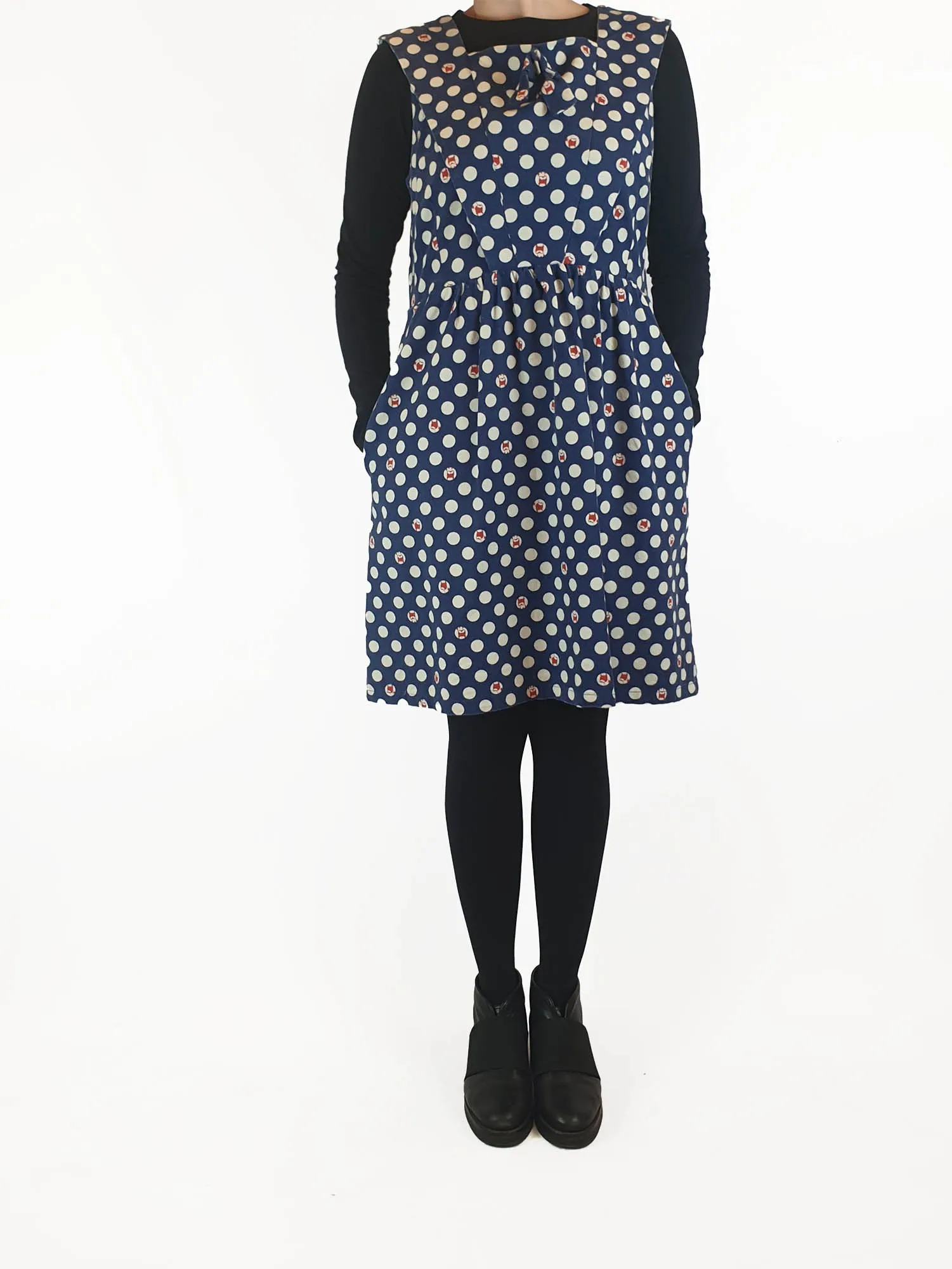 Made590 sleeveless blue and white polka dot dress with dog faces size M (best fits 10)